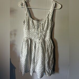 Chic White Dress with Floral Accents